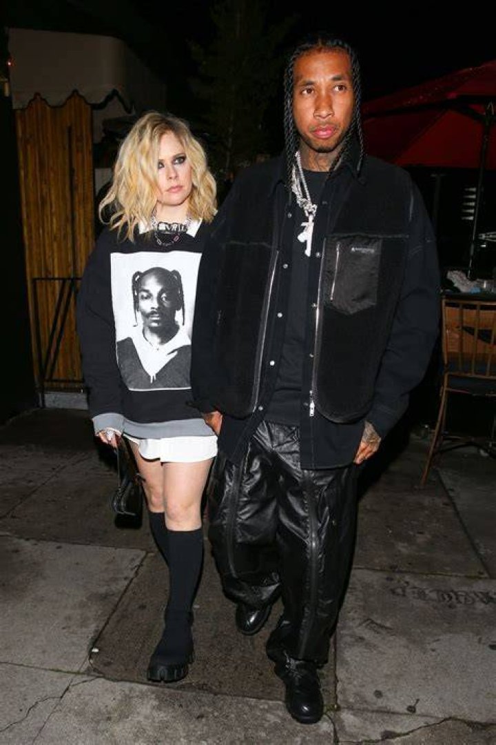 Avril Lavigne & Tyga Hold Hands At Kyrie Irvings Birthday Party Hollywood Life